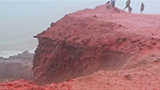 Watch: Iran beach turns bright red after mysterious blood rain